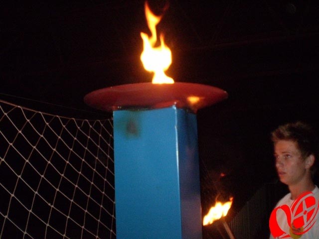 Momento especial da abertura o acendimento da pira olimpica.